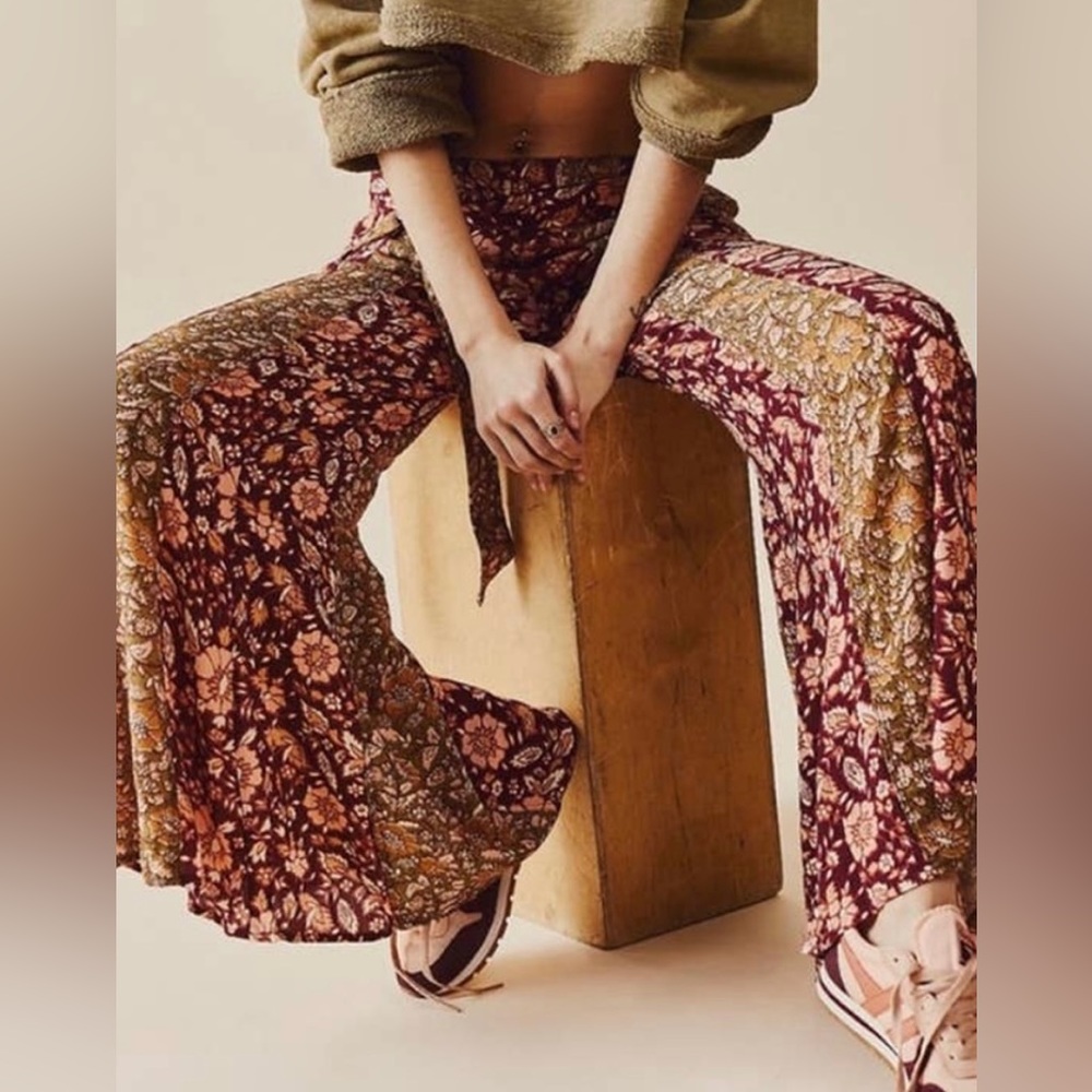 NWOT! Free People Bali Boho flare pants. Color multi reds and greens. Sizes: M,L - Picture 3 of 14